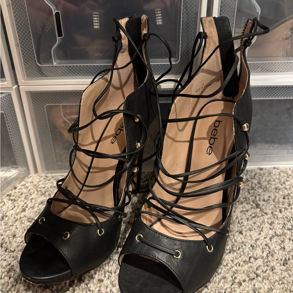 Bebe Black Stiletto Heels with Lace-Up Design